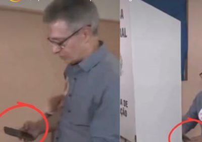 Romeu Zema desrespeita regra da Justiça Eleitoral ao levar celular para cabine de votação Romeu Zema desrespeita regra da Justiça Eleitoral ao levar celular para cabine de votação
